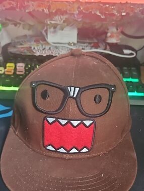 Brown Novelty Snapback Hat with Red Mouth Patch